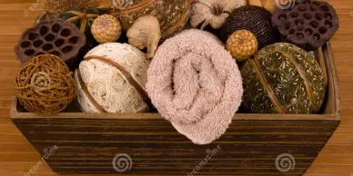 Spa wellness items in a wooden box